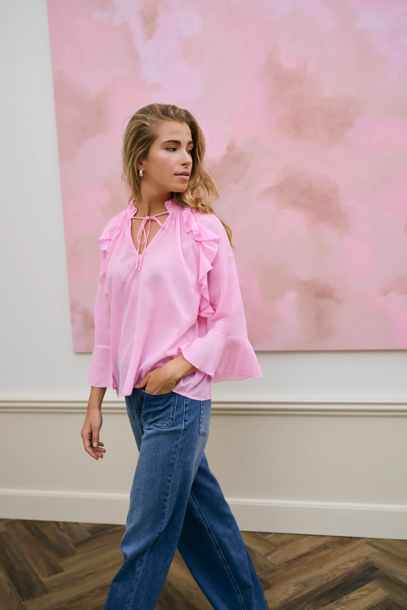 Pink Ruffle Blouse and Jeans with pearl drop earrings