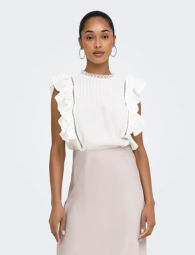 White Ruffle Blouse and Midi Skirt with silver drop earrings