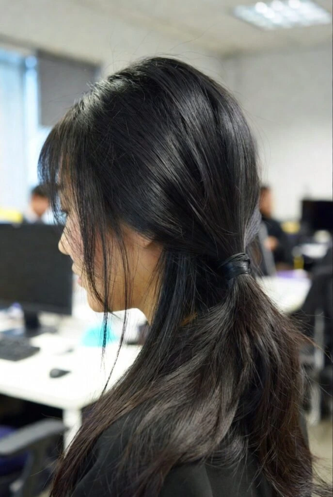 Smooth Desk-to-Dinner Hair With A Low Bun Finish