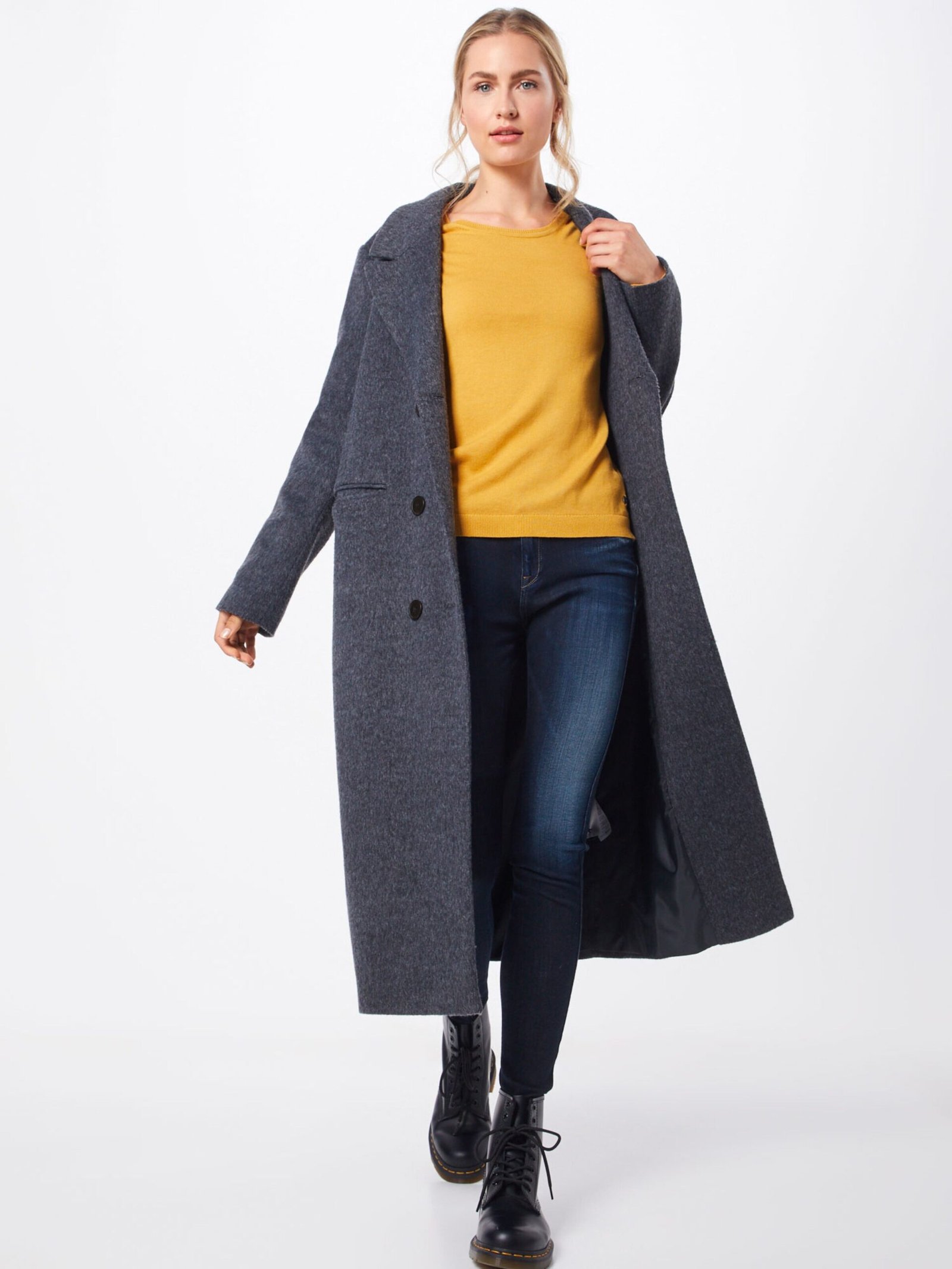 22 Grey Wool Coat Outfits for Winter Weekends That Are Chic, Warm and Elegant 17 Grey Wool Coat Over a Yellow Knit and Jeans