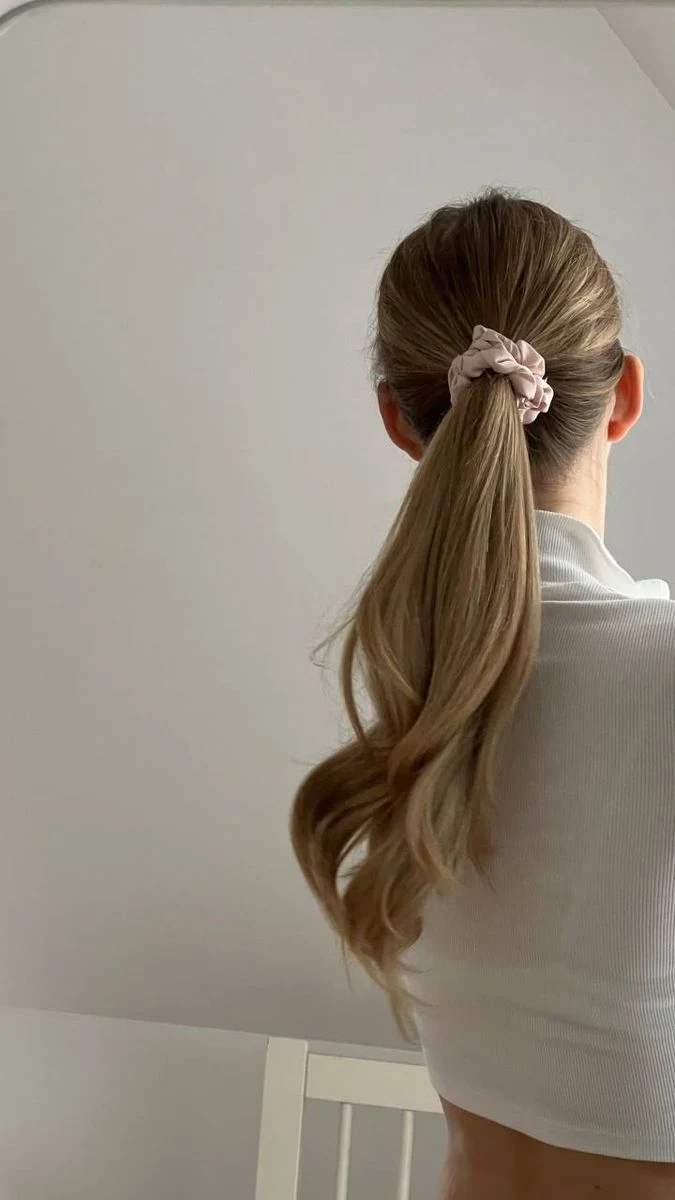 30 Hat Proof Low Ponytail Hairstyles for Winter Walks - Idea 6