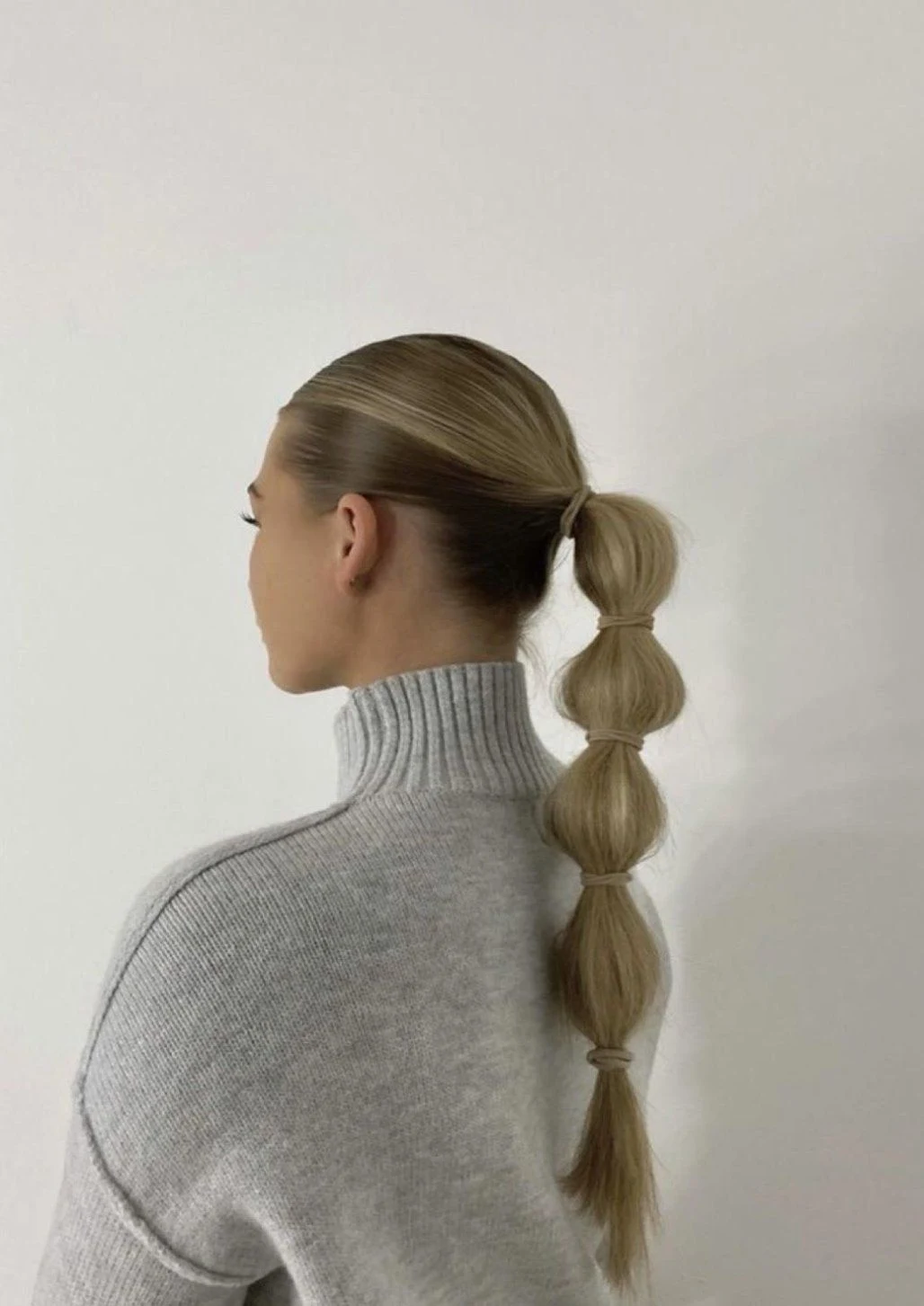 30 Hat Proof Low Ponytail Hairstyles for Winter Walks - Idea 11