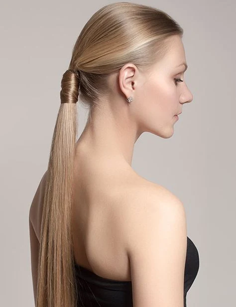 30 Hat Proof Low Ponytail Hairstyles for Winter Walks - Idea 13