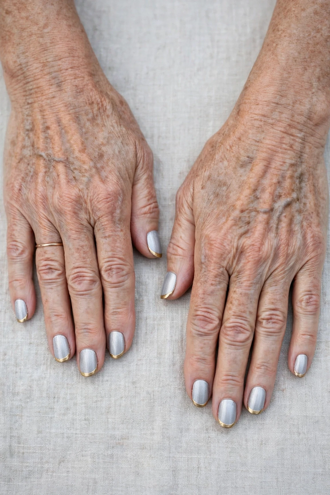 50 Icy Silver Frosted French Nails For Women Over 60 For New Year Celebrations That Are Chic, Warm and Elegant 16 Icy Silver Frosted French Nails with a velvet matte finish and gold French tips