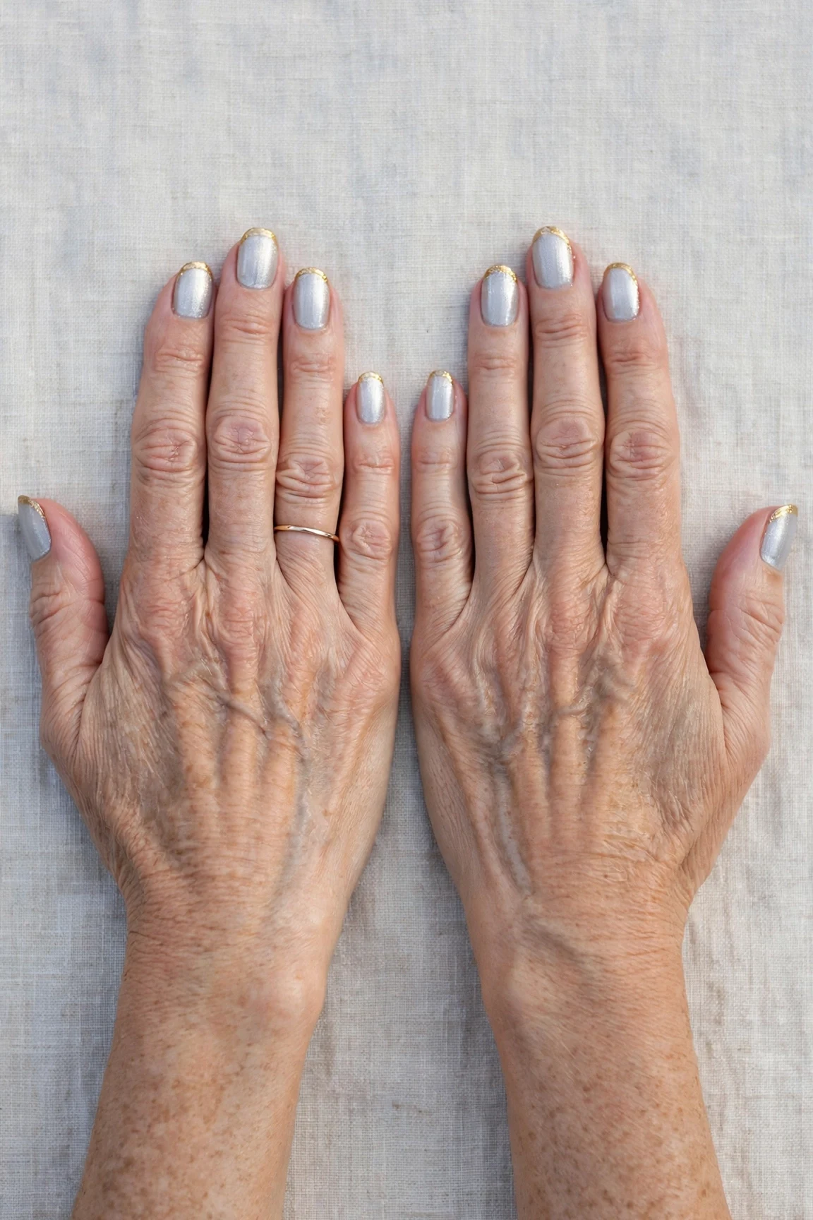 50 Icy Silver Frosted French Nails For Women Over 60 For New Year Celebrations That Are Chic, Warm and Elegant 23 Icy Silver Frosted French Nails with a glassy gel finish and gold French tips