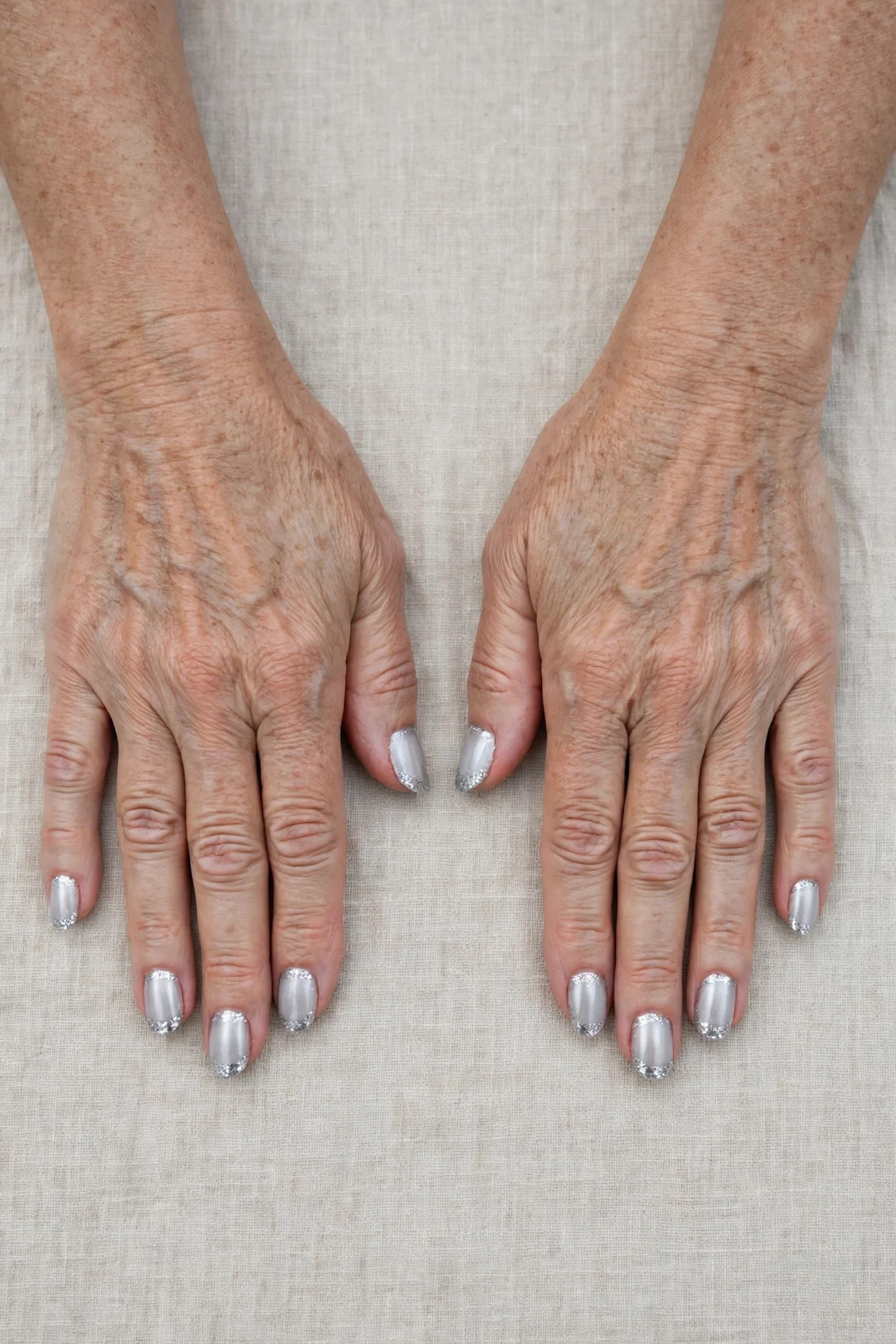 50 Icy Silver Frosted French Nails For Women Over 60 For New Year Celebrations That Are Chic, Warm and Elegant 29 Icy Silver Frosted French Nails with a chrome shine and glitter French tips