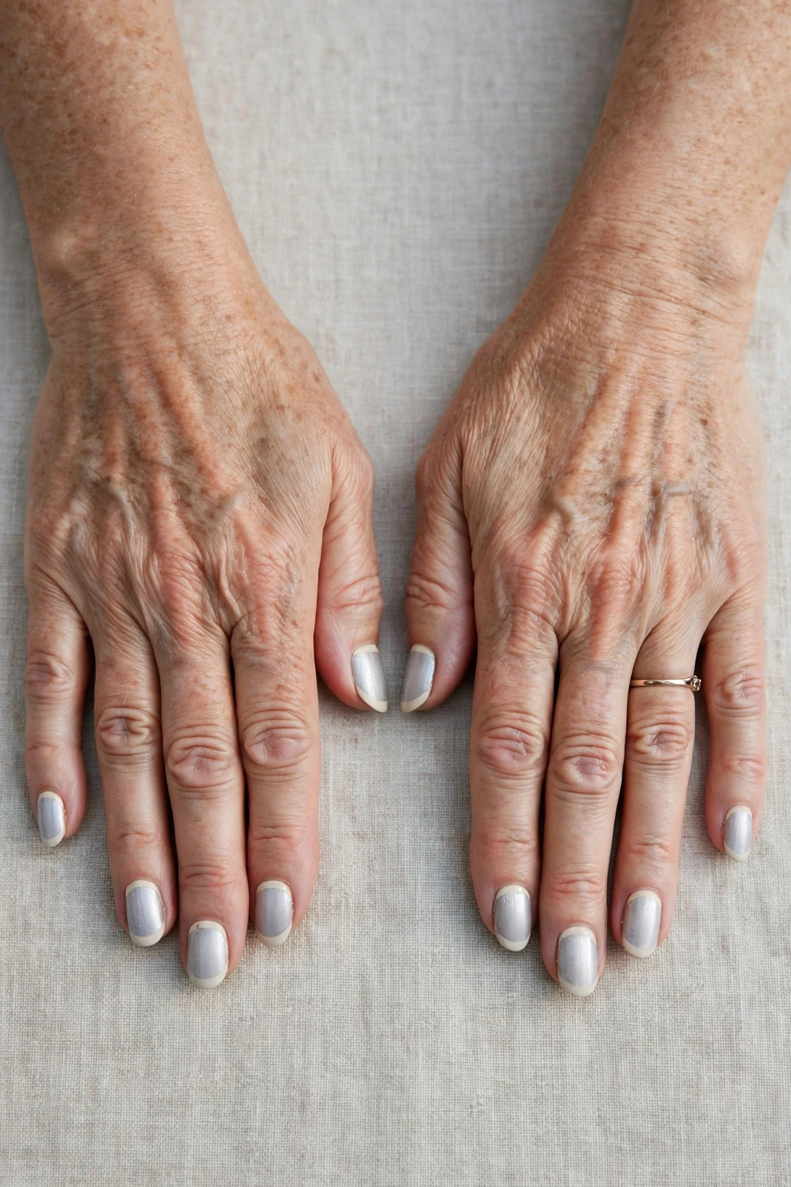 50 Icy Silver Frosted French Nails For Women Over 60 For New Year Celebrations That Are Chic, Warm and Elegant 46 Icy Silver Frosted French Nails with a satin finish and reverse French tips in cream