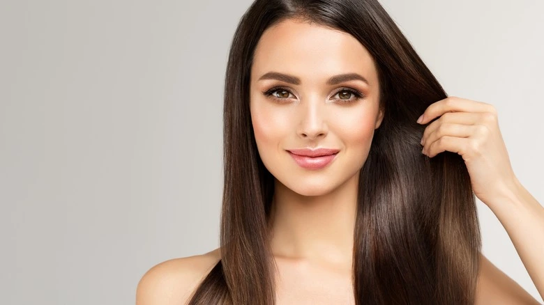 38 Long Glass Hair Hairstyles For Women In Their 30s With Straight Polished Lengths That Are Sleek, Shiny and Polished 36 Liquid Long Hair With Glossy Roots