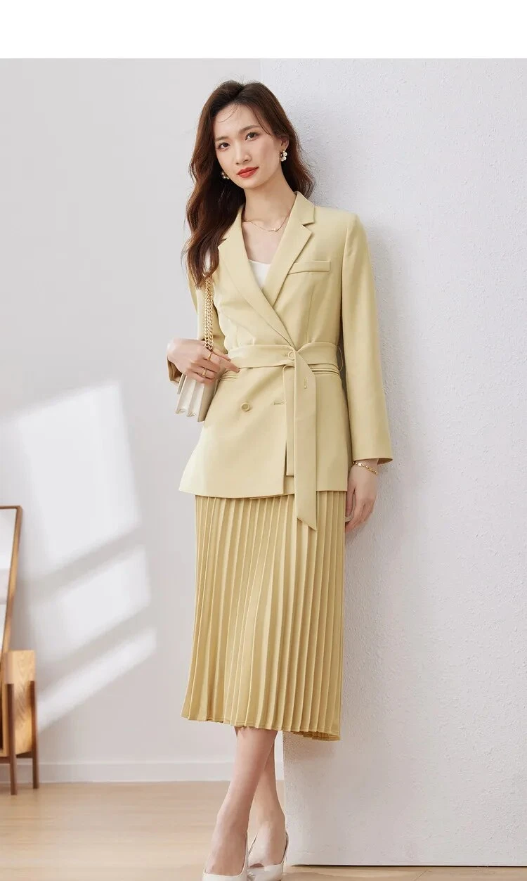 Pale Yellow Blazer and Midi Skirt with a delicate gold bracelet