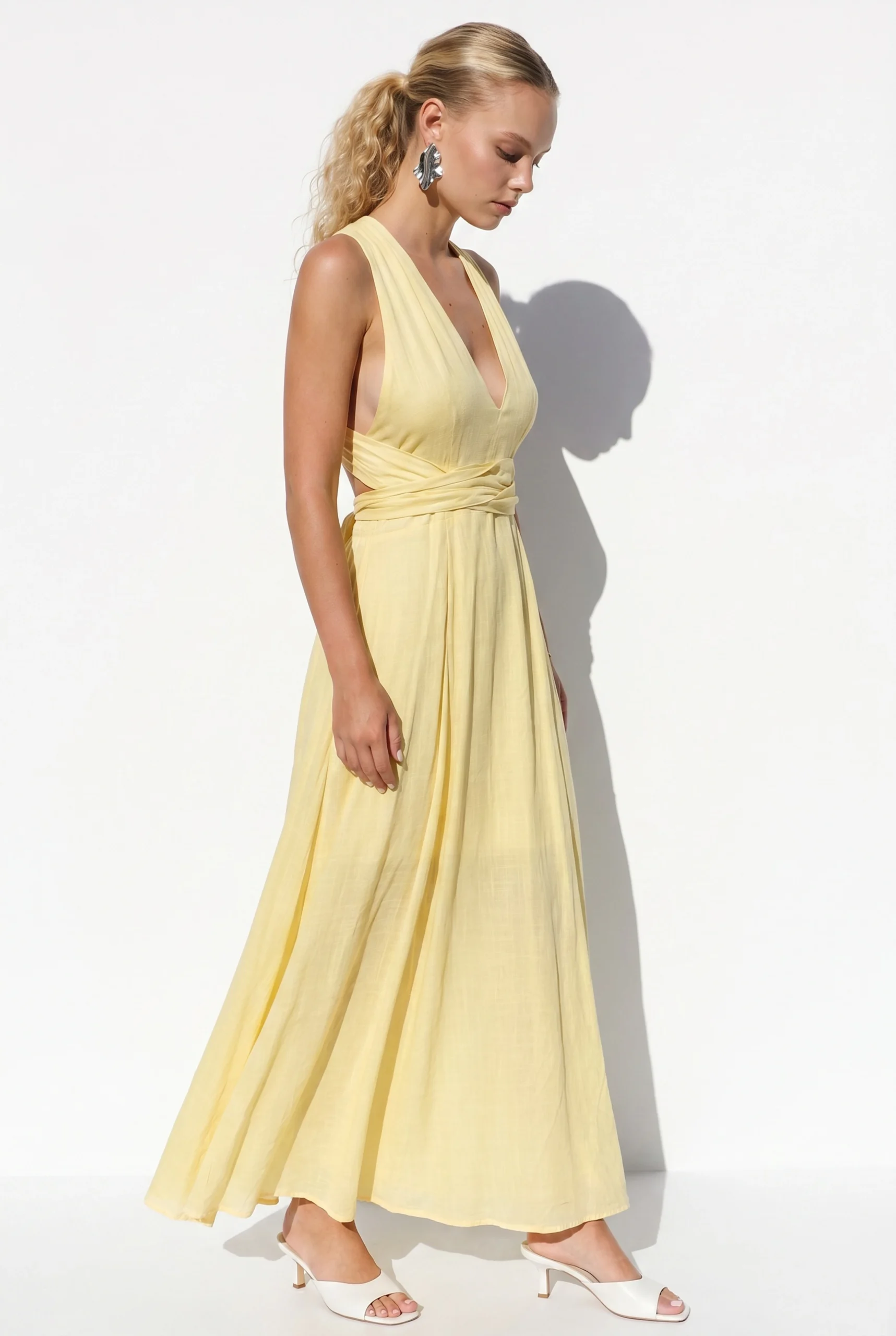 Pale Yellow Maxi Dress with silver drop earrings