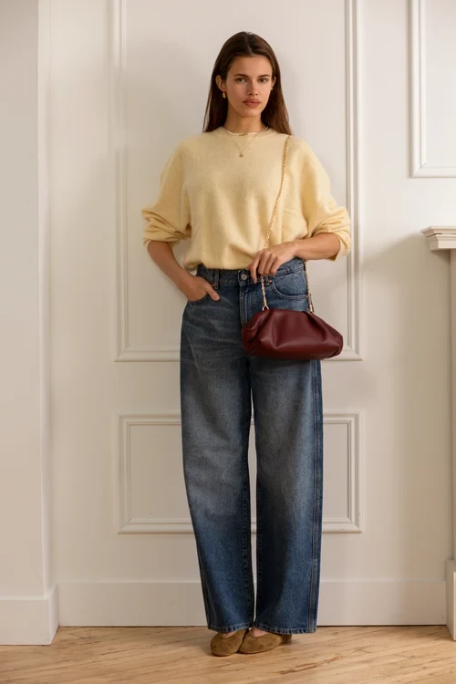 Pale Yellow Oversized Sweater with a burgundy clutch