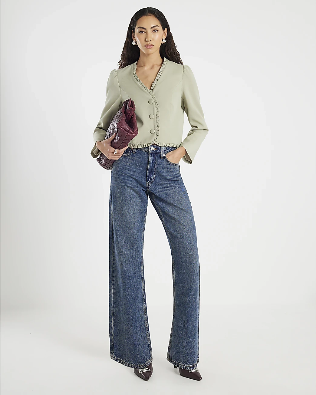Green Check Jacket and Wide-Leg Jeans with a burgundy clutch