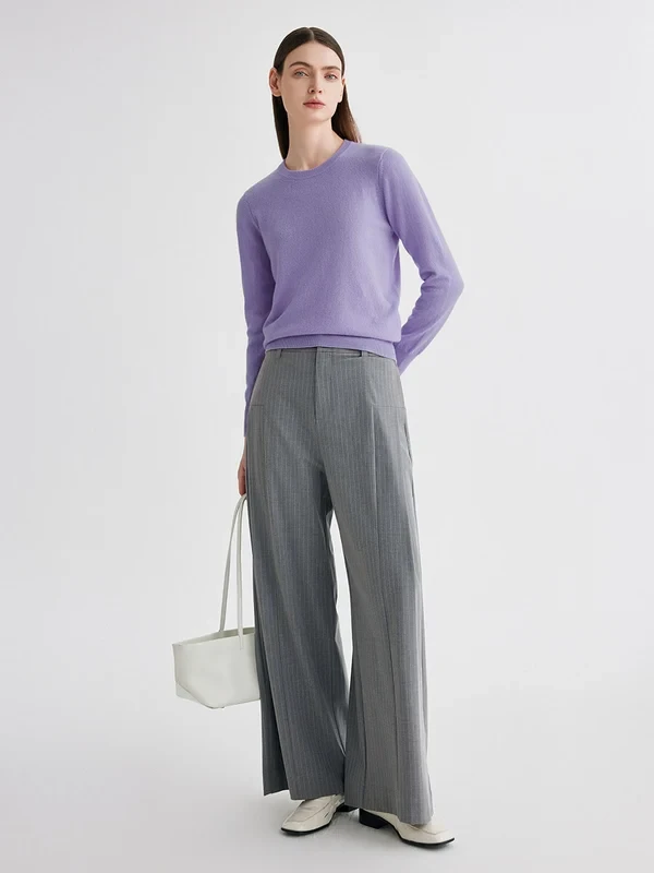 Lavender cashmere sweater with grey tailored trousers