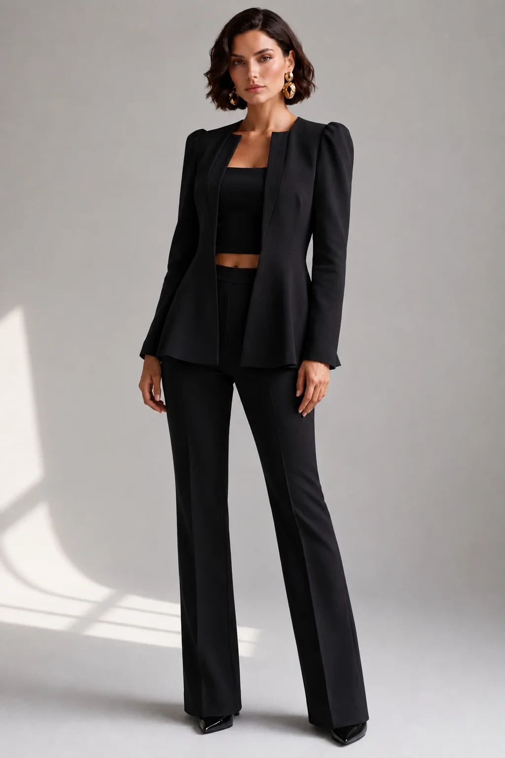 Black Peplum Jacket and Trousers with silver drop earrings