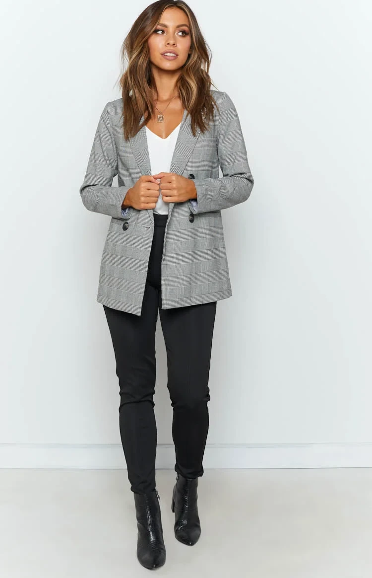 Grey check blazer with black slim trousers