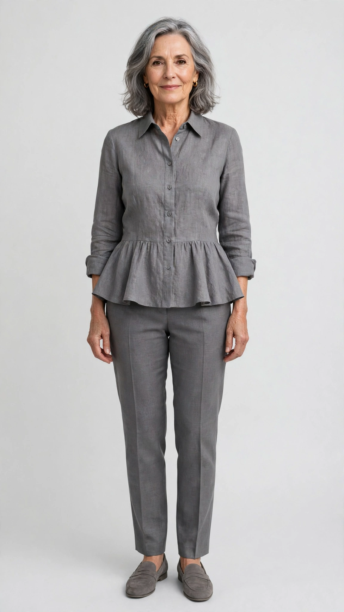 40 Women Over 50 Peplum Blouse and Trouser Outfits for March Office Days That Are Fresh, Chic and Easy to Wear 6 Peplum linen blouse with grey trousers
