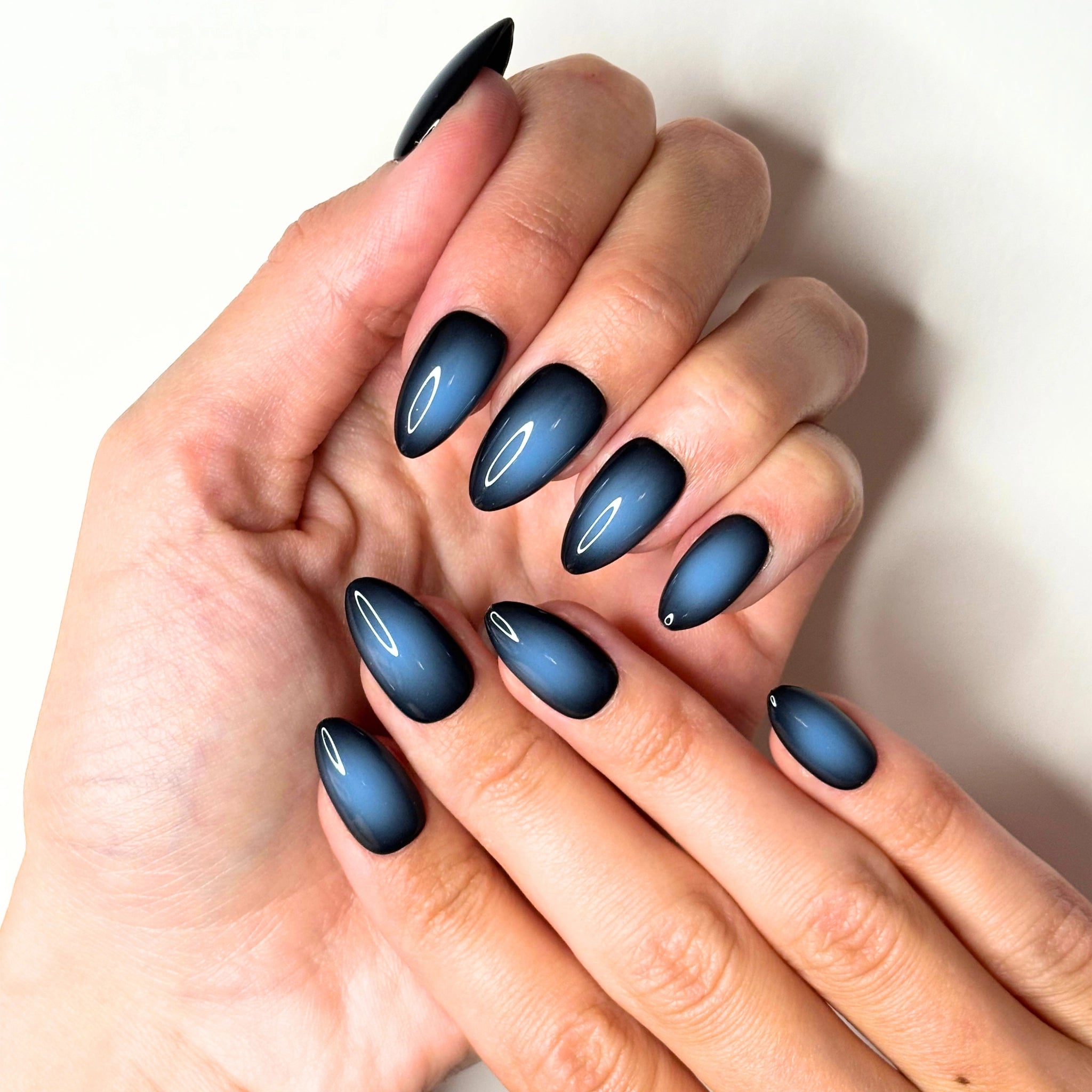 Matte Navy Blue Gradient Oval Nails for January