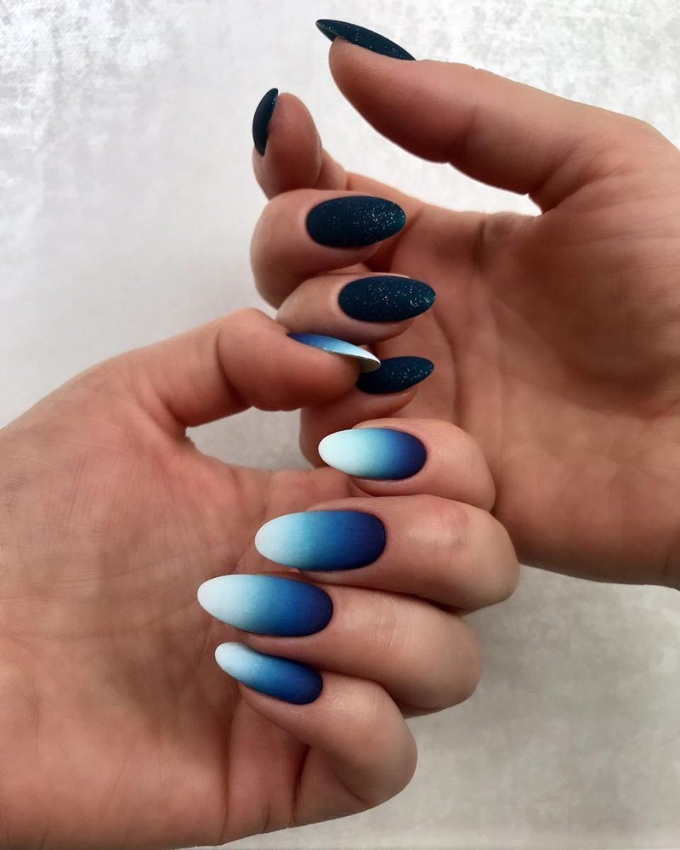 Matte Navy Gradient Oval Nails with a Glitter Accent for January