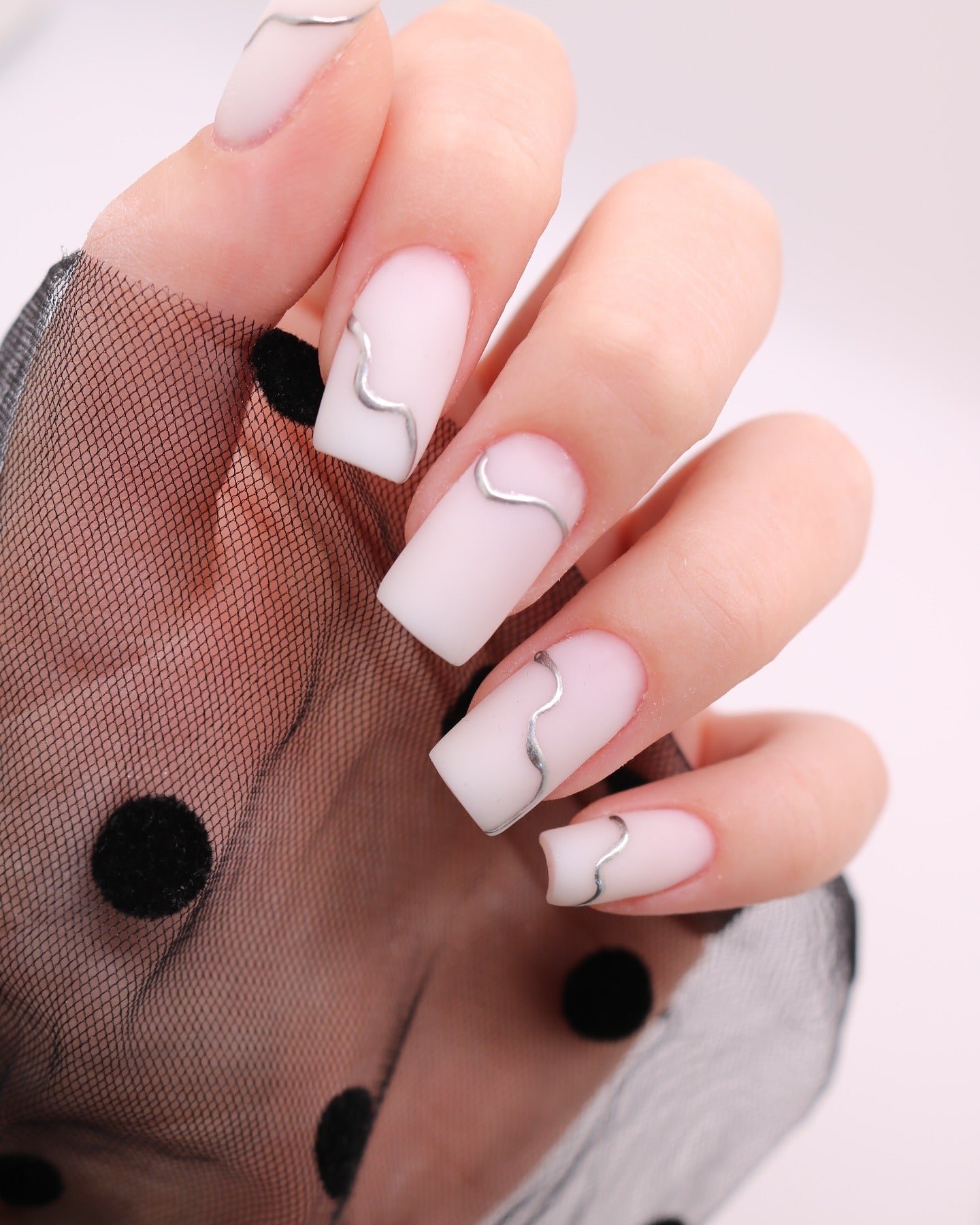 38 Matte Top Coat Jelly Nails for Winter Everyday Wear That Are Soft, Natural and Easy to Live With 30 Matte Milky White Square Nails with a Silver Wave Accent for Winter Everyday Wear