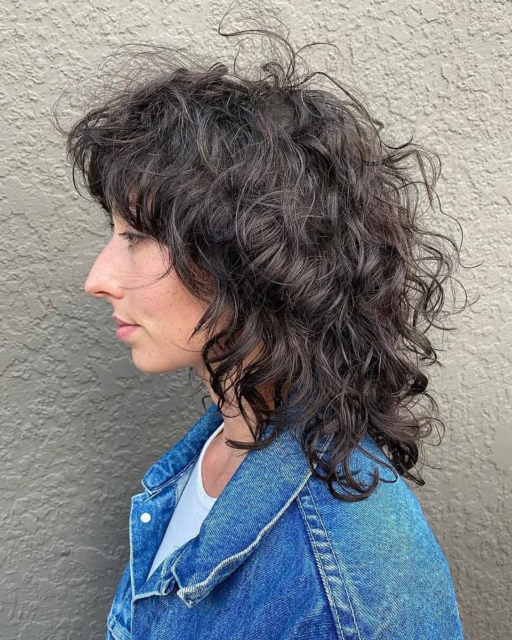 Natural Texture Spring Hairstyles For Curly Hair With Defined Curls With A Sleek Straight Finish, Blunt Ends With Soft Layers And Natural Brunette Depth