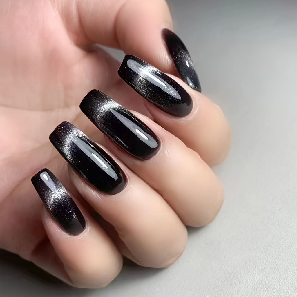 Almond Black Plum Cat Eye Nails with a Silver Magnetic Line for January Evenings