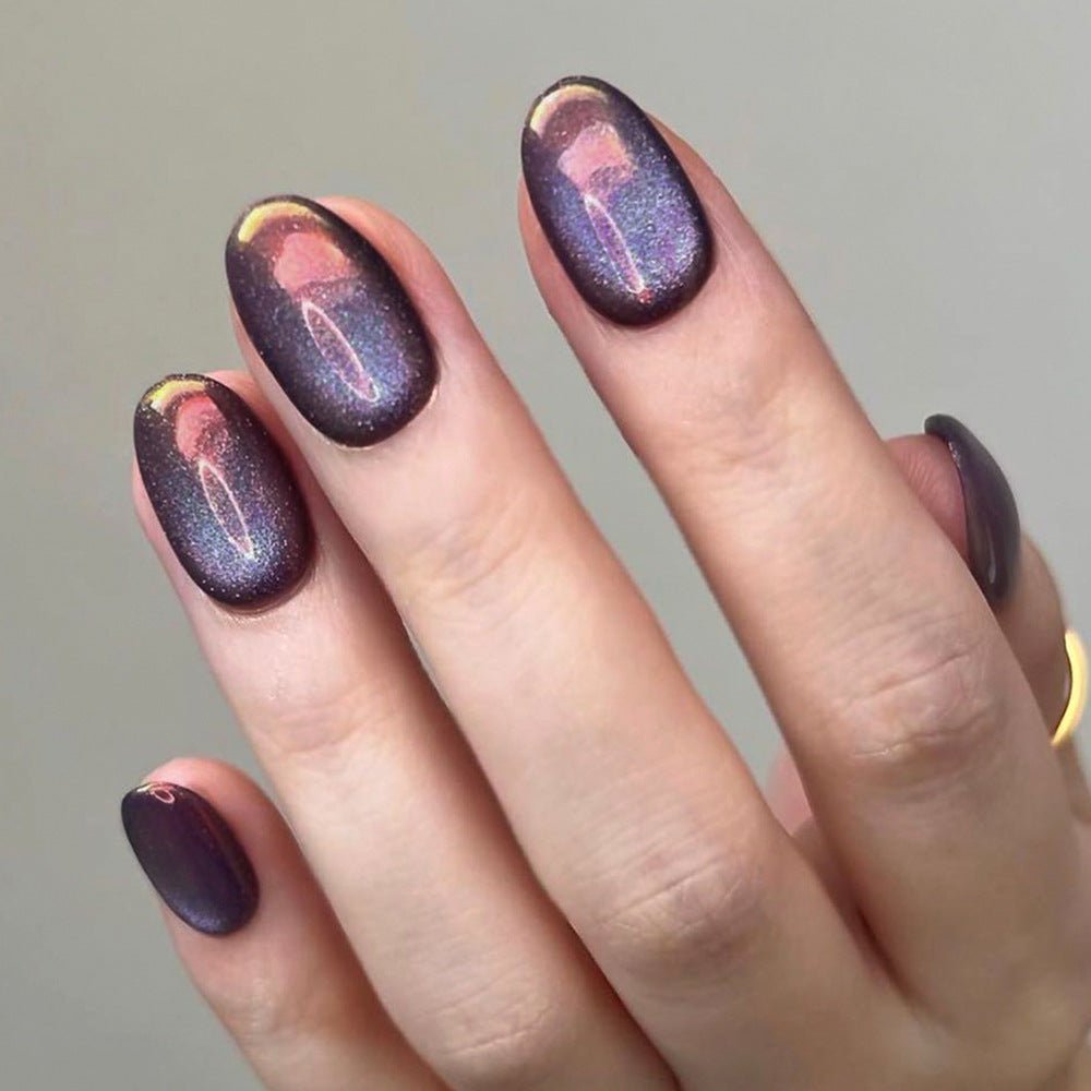Short Plum Cat Eye Nails with a Warm Shine for January Evenings
