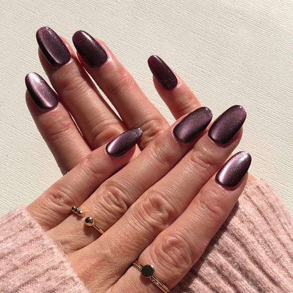 Plum Cat Eye Nails for January Evenings with a Soft Magnetic Finish