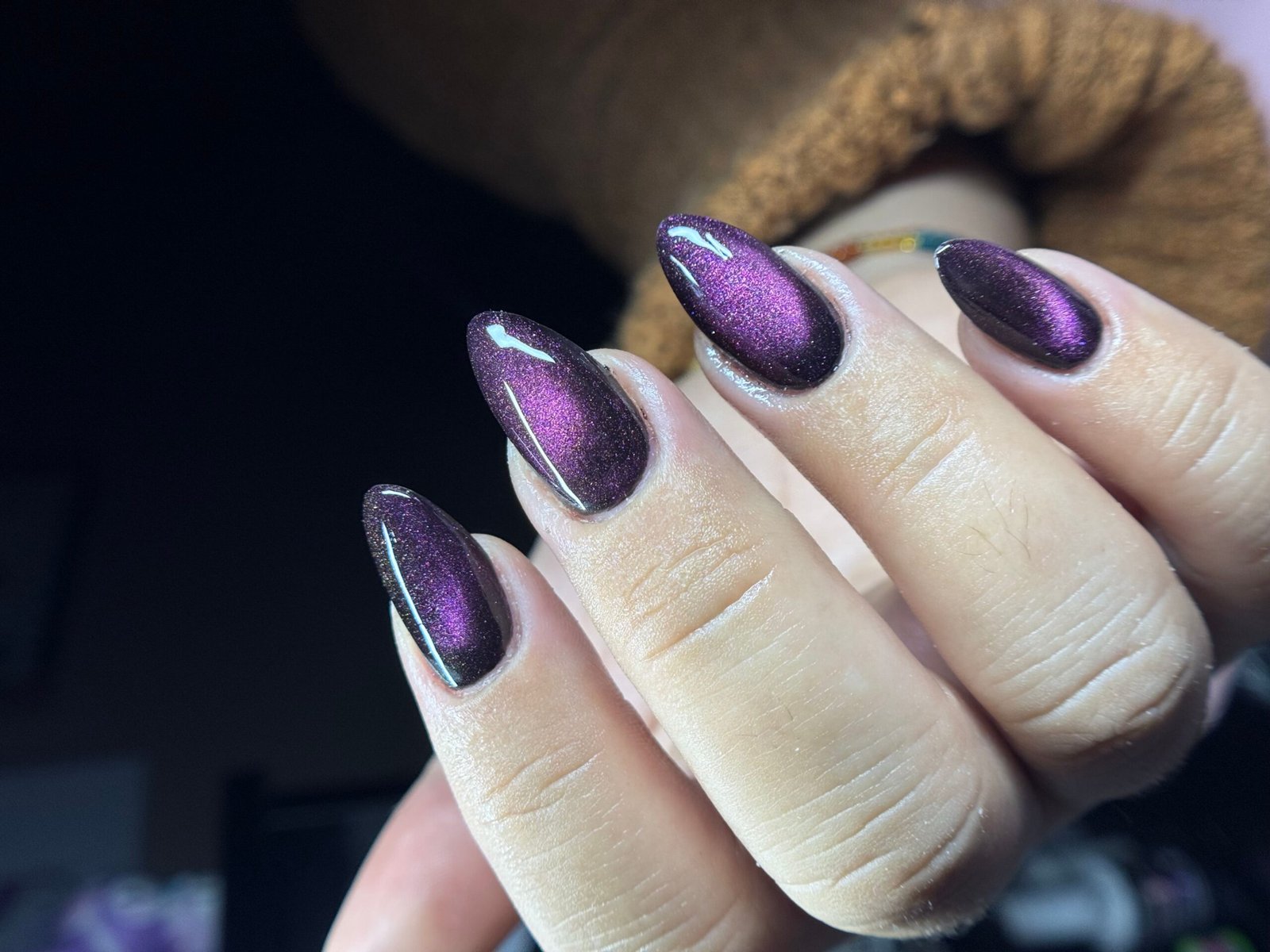 Plum Cat Eye Nails for January Evenings with a Deep Shine