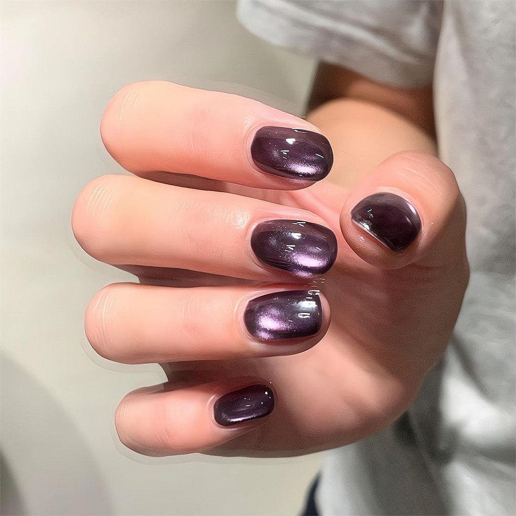 Short Plum Cat Eye Nails for January Evenings