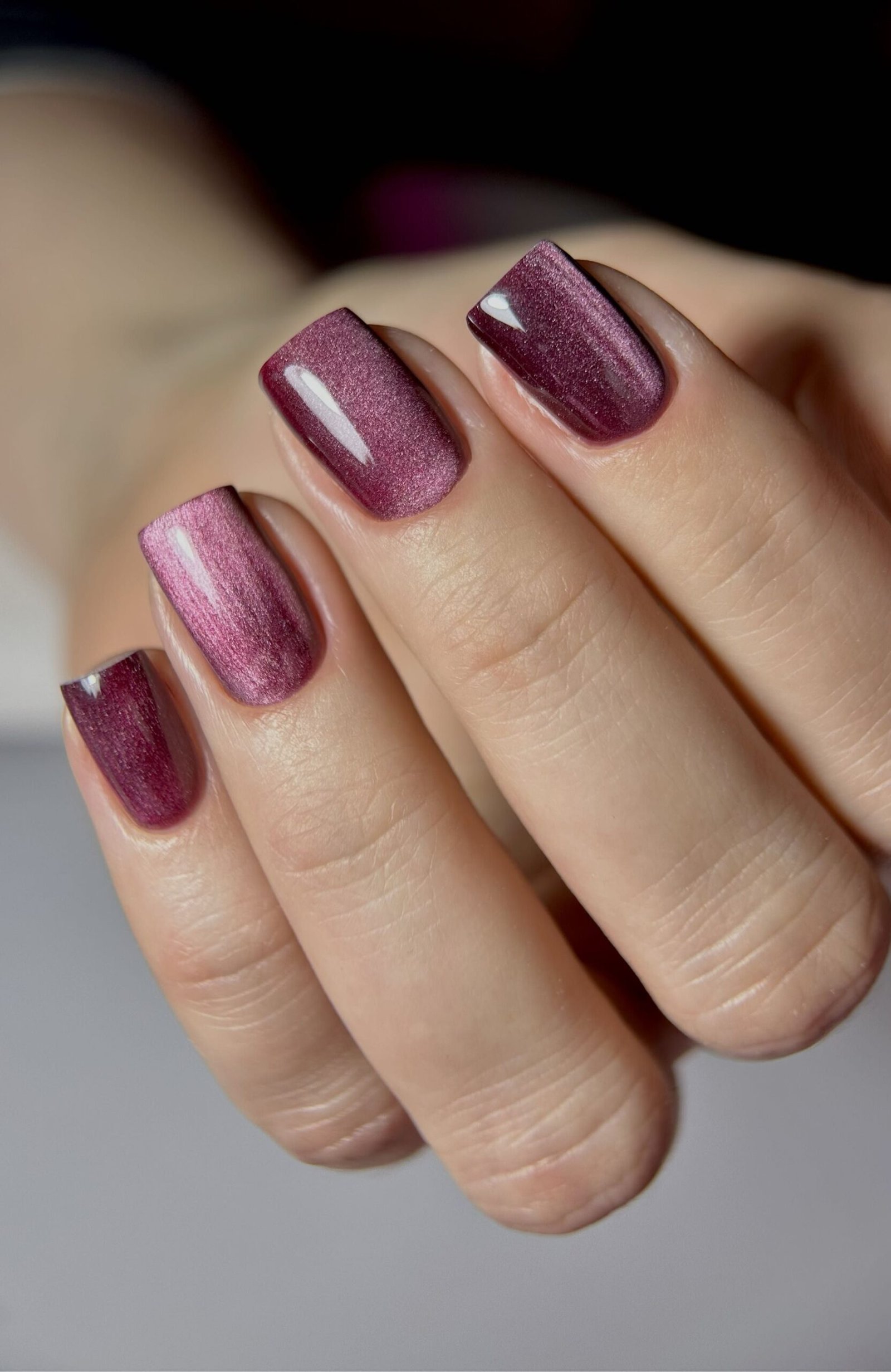 Plum Cat Eye Nails for January Evenings with a Bright Magnetic Line