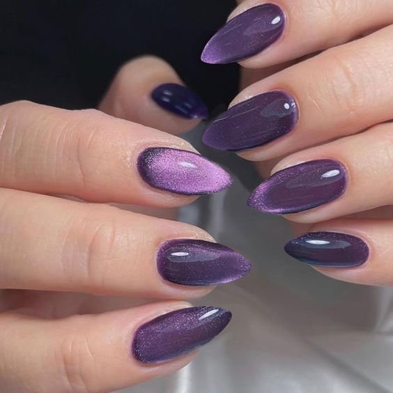Almond Deep Purple Cat Eye Nails with a Soft Magnetic Shine for Winter Parties