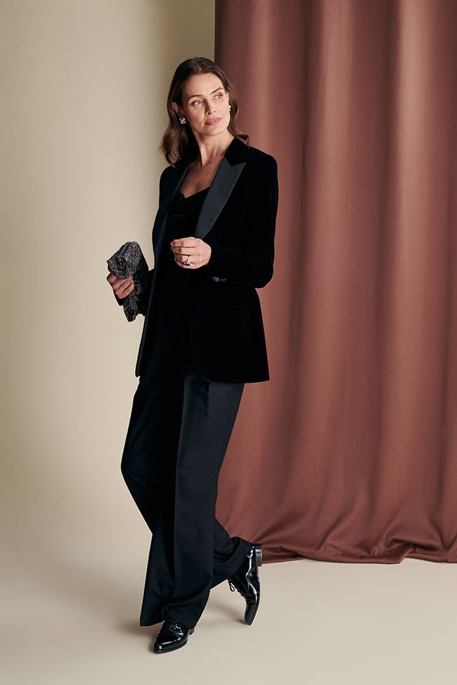 Black Velvet Tuxedo Blazer with a Clutch and Wide-Leg Trousers
