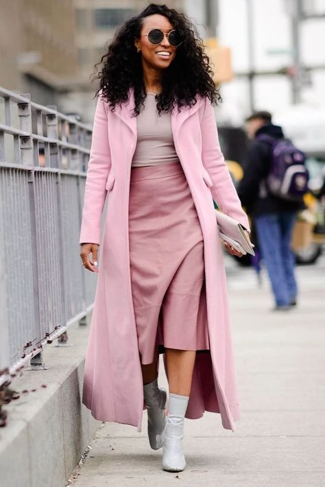 Fuchsia pink tiered skirt outfit with leather ankle boots and a cashmere wrap