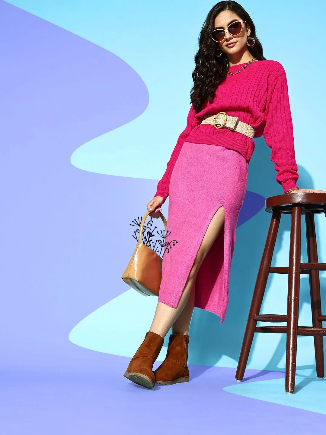 Hot pink sweater and midi skirt outfit with suede ankle boots and a cashmere wrap
