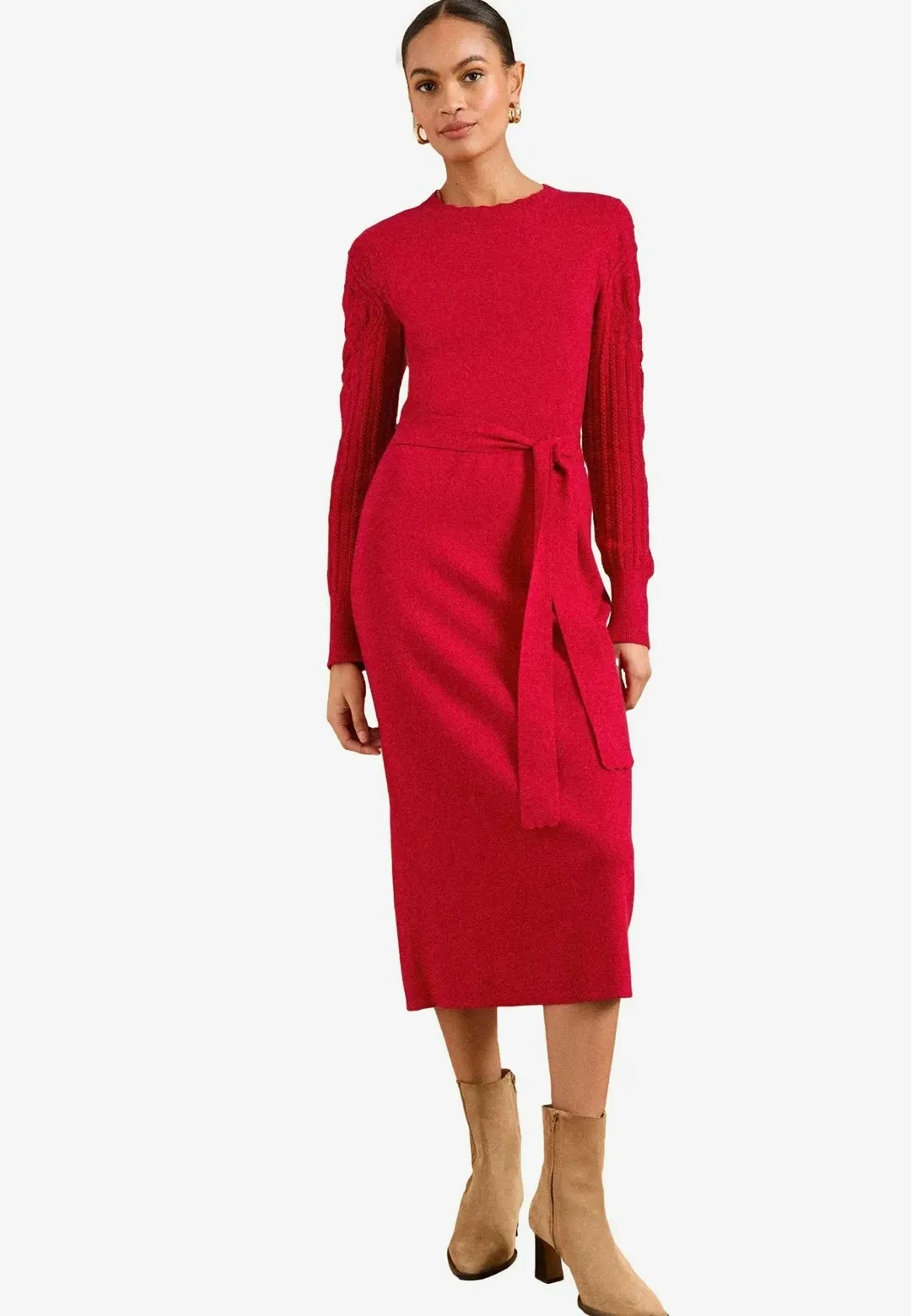 Brick red cable-knit dress with suede ankle boots and a slim leather belt