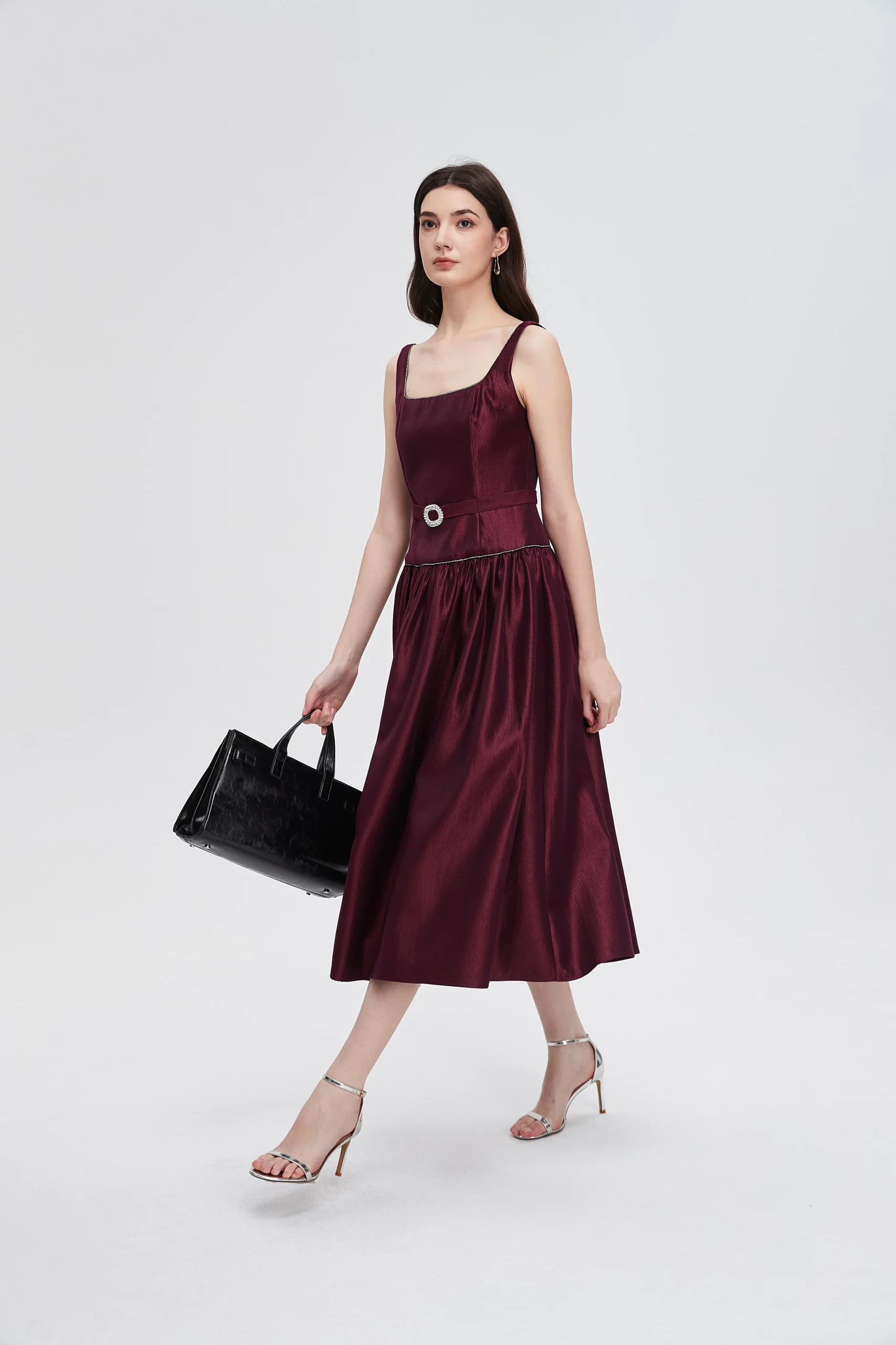 Scarlet satin A-line dress with kitten heels and a chic crossbody bag