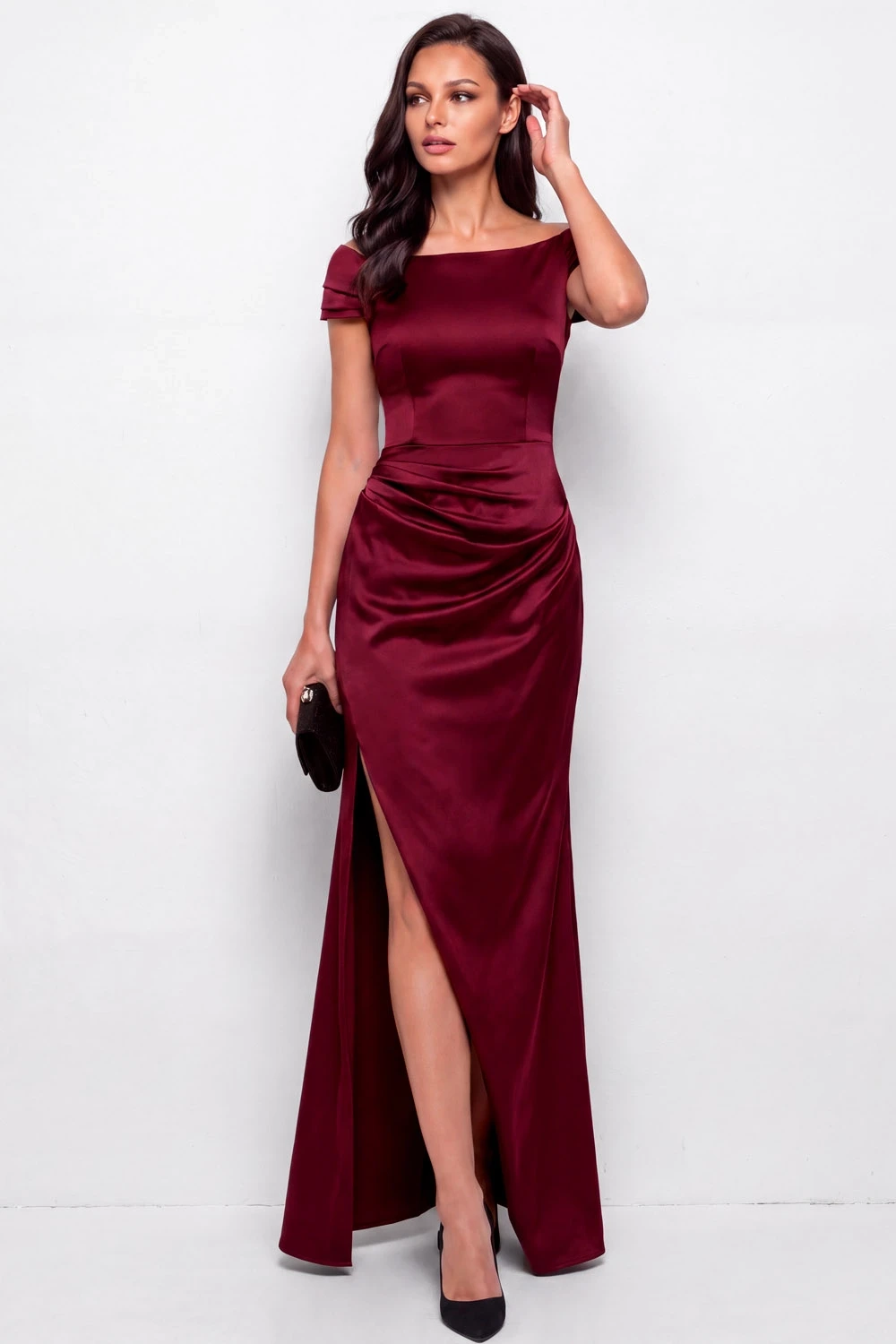 Wine satin off-shoulder dress with low-heeled pumps and a small structured clutch