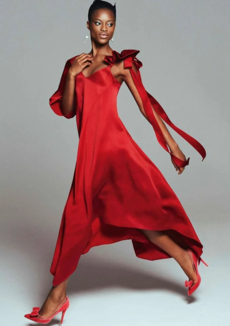 Scarlet satin sheath dress with kitten heels and statement earrings