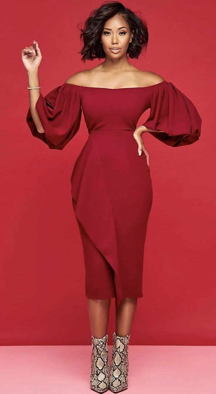 Scarlet satin off-shoulder dress with leather ankle boots and statement earrings