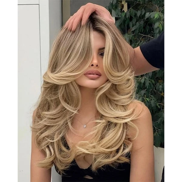 33 Retro Blowout Hairstyles for Long Hair with Flipped-Out Layers That Feel Bouncy, Flowing and Easy to Wear 15 Retro Long Blowout with a High Crown and Flipped Ends