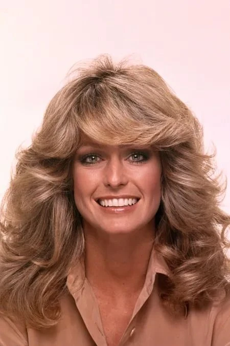 33 Retro Blowout Hairstyles for Long Hair with Flipped-Out Layers That Feel Bouncy, Flowing and Easy to Wear 22 Long Hair Blowout with a Relaxed Flipped Shape