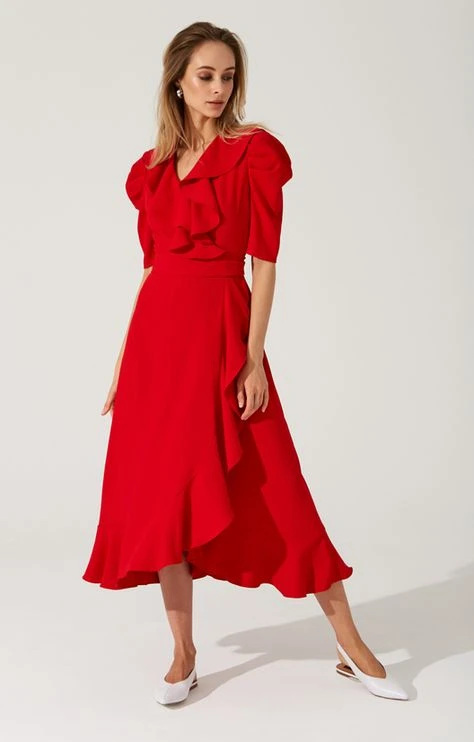 Red ruffle wrap dress with low-heeled pumps and a pearl bracelet