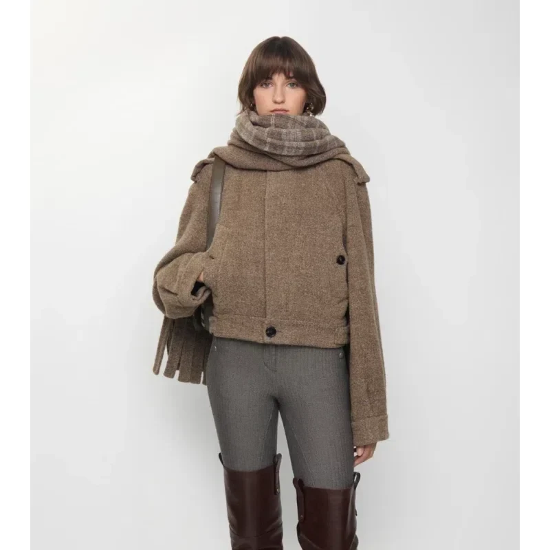 30 Scarf and Coat Layering Outfits for Snowy Walks That Are Chic, Warm and Elegant 15 Brown Coat with a Tartan Scarf with Grey Trousers and Brown Knee-high Boots