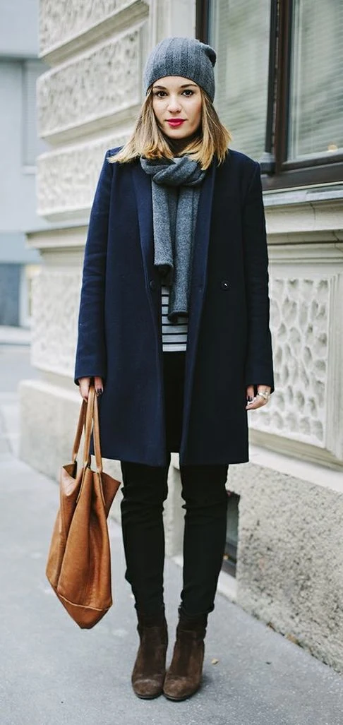 30 Scarf and Coat Layering Outfits for Snowy Walks That Are Chic, Warm and Elegant 22 Navy Coat with a Grey Scarf with Black Skinny Jeans and Dark Brown Boots