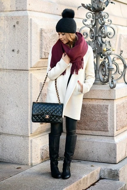 30 Scarf and Coat Layering Outfits for Snowy Walks That Are Chic, Warm and Elegant 30 Cream Coat with a Burgundy Scarf with Black Skinny Jeans and Black Knee-high Boots