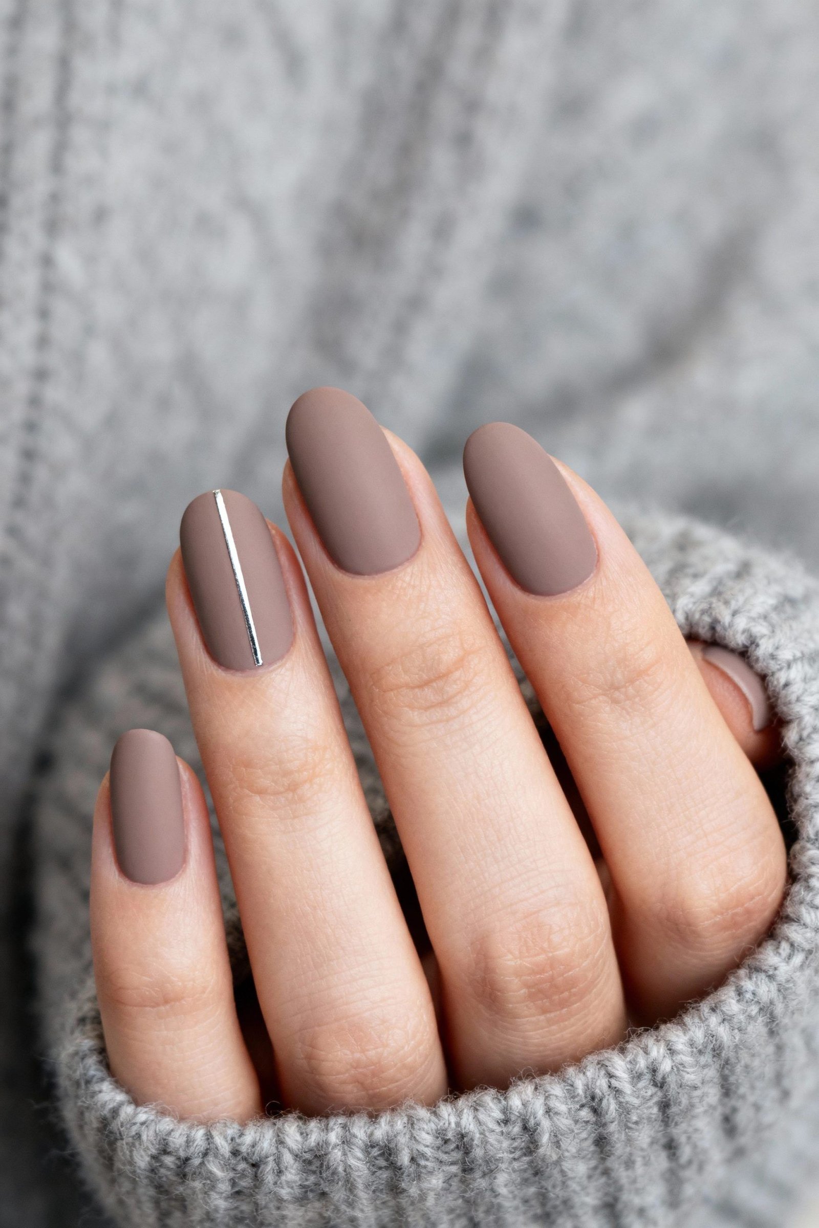 Matte Taupe Oval Nails with a Silver Stripe Accent for January Office Looks