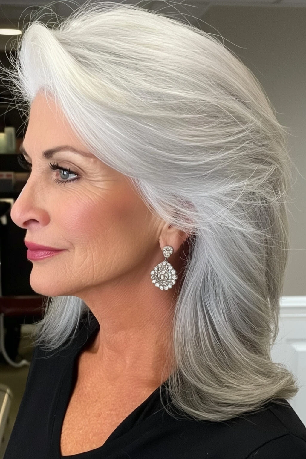 38 Sleek Winter Blowout Hairstyles for Women Over 50 With a Side Part That Are Chic, Polished and Easy to Wear 5 Deep Sleek Side Part for Evenings