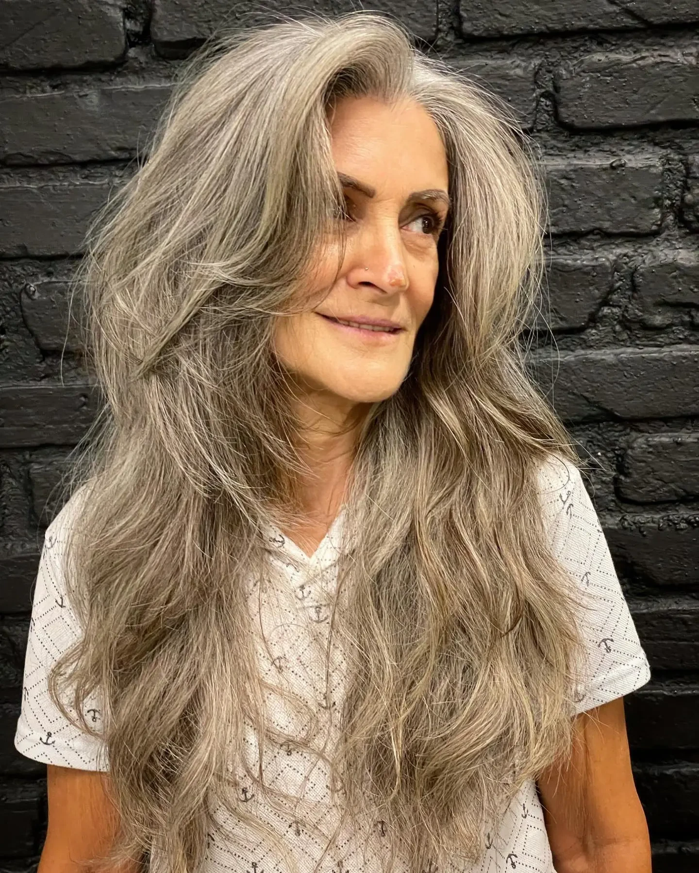 38 Sleek Winter Blowout Hairstyles for Women Over 50 With a Side Part That Are Chic, Polished and Easy to Wear 14 Sleek Side Part With Long Length