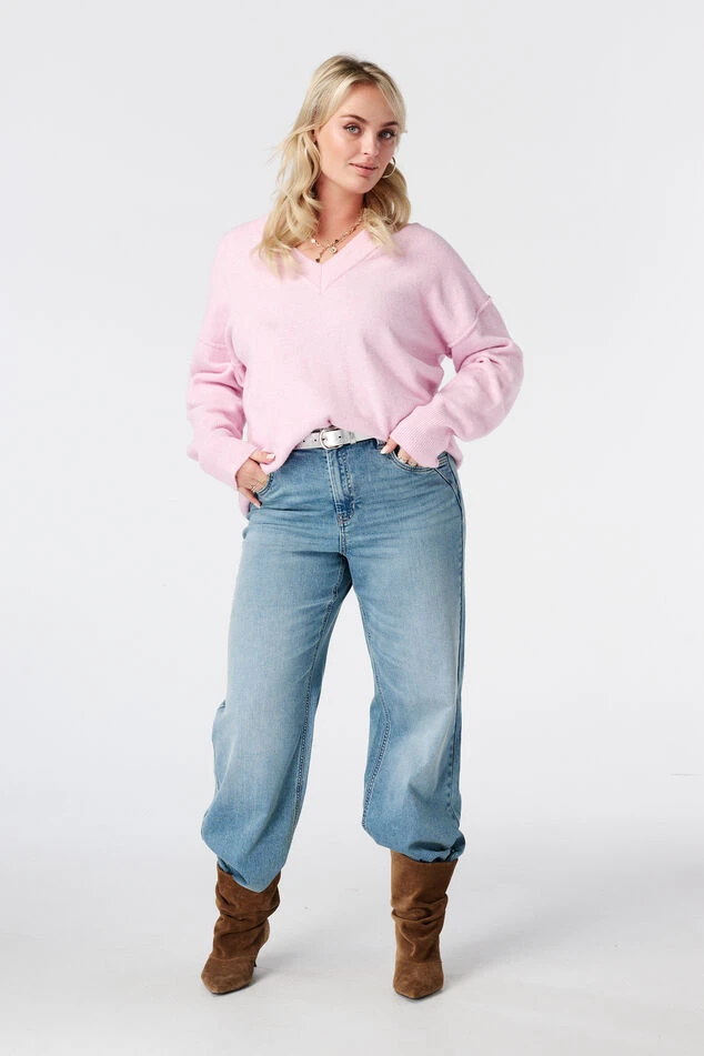 Rose soft pink knit and jeans outfit with suede ankle boots and silver drop earrings