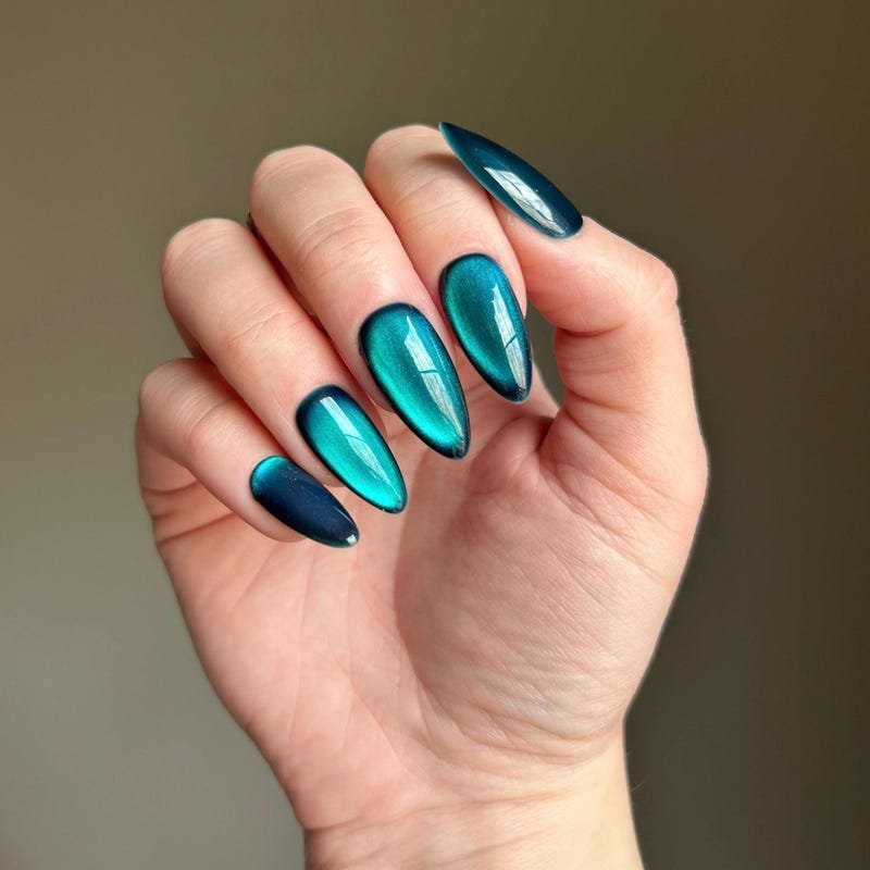 Bright Teal Cat Eye Almond Nails for Winter Date Nights